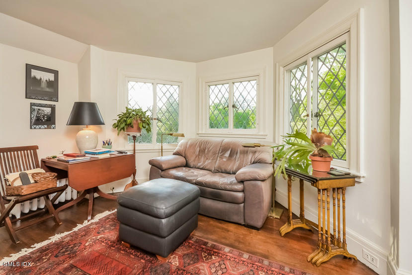 127 Dingletown Road Greenwich, CT 06830 - Photo 20 of 48 a living room with furniture and a window