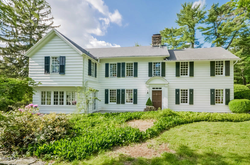 127 Dingletown Road Greenwich, CT 06830 - Photo 2 of 48 front view of a house with a yard