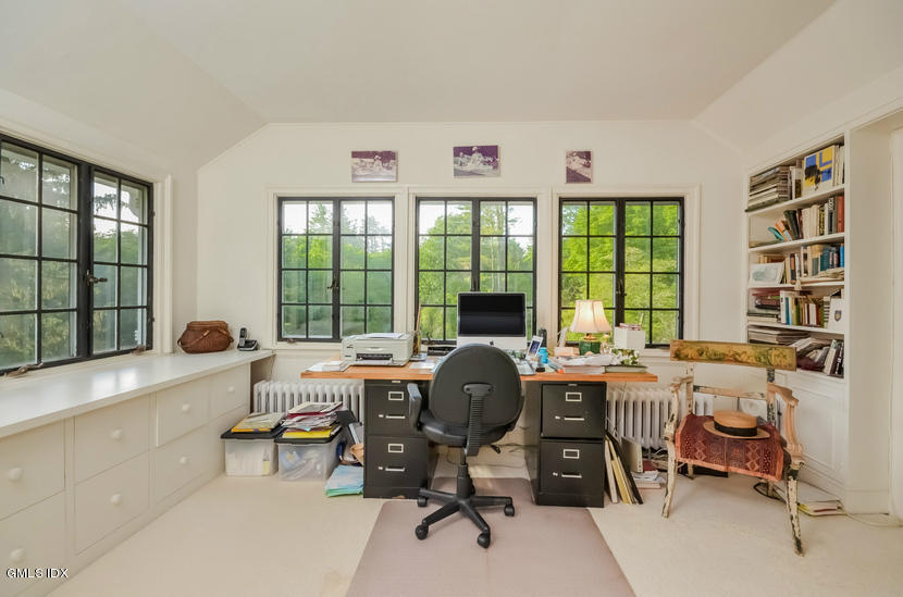 127 Dingletown Road Greenwich, CT 06830 - Photo 21 of 48 a view of a workspace with furniture and a window