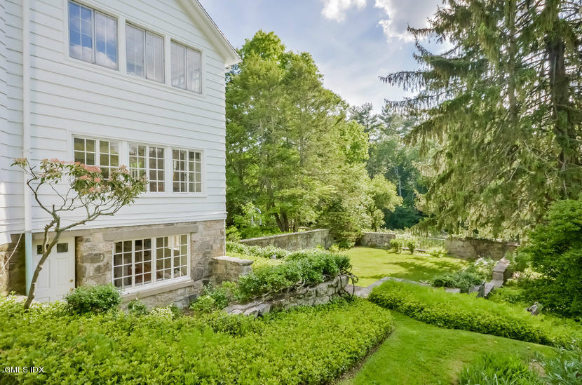 127 Dingletown Road Greenwich, CT 06830 - Photo 39 of 48 a view of a house with a yard