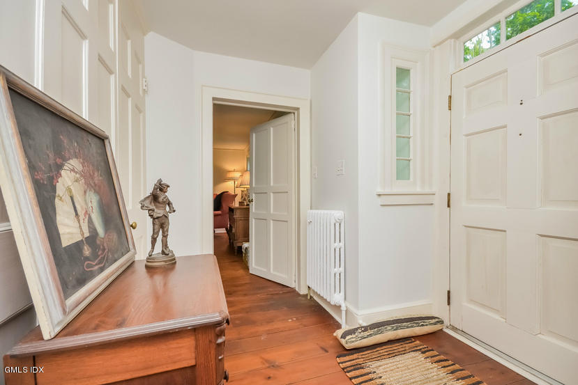 127 Dingletown Road Greenwich, CT 06830 - Photo 4 of 48 a view of an entryway with wooden floor