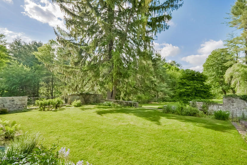 127 Dingletown Road Greenwich, CT 06830 - Photo 43 of 48 a view of outdoor space with deck and green space