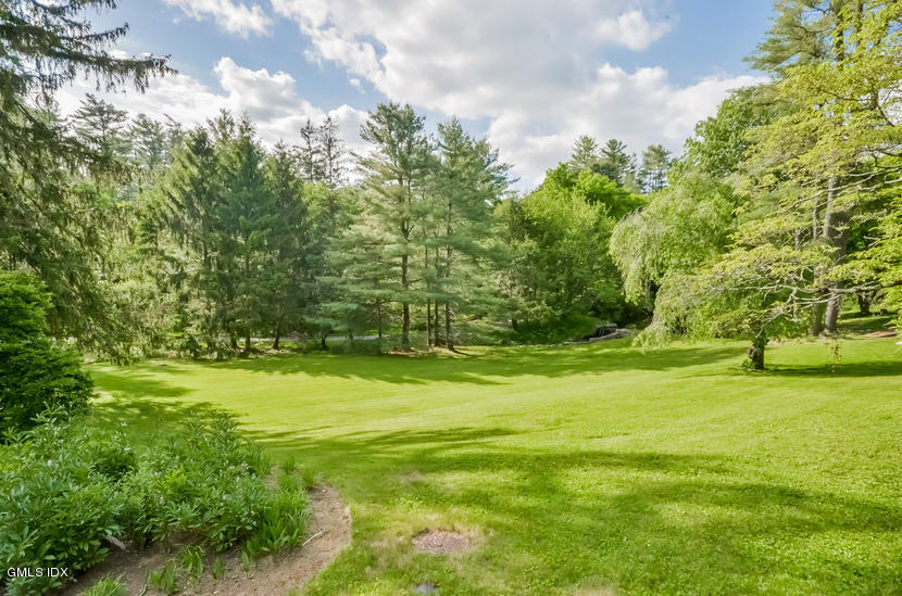 127 Dingletown Road Greenwich, CT 06830 - Photo 45 of 48 a view of a grassy field with trees