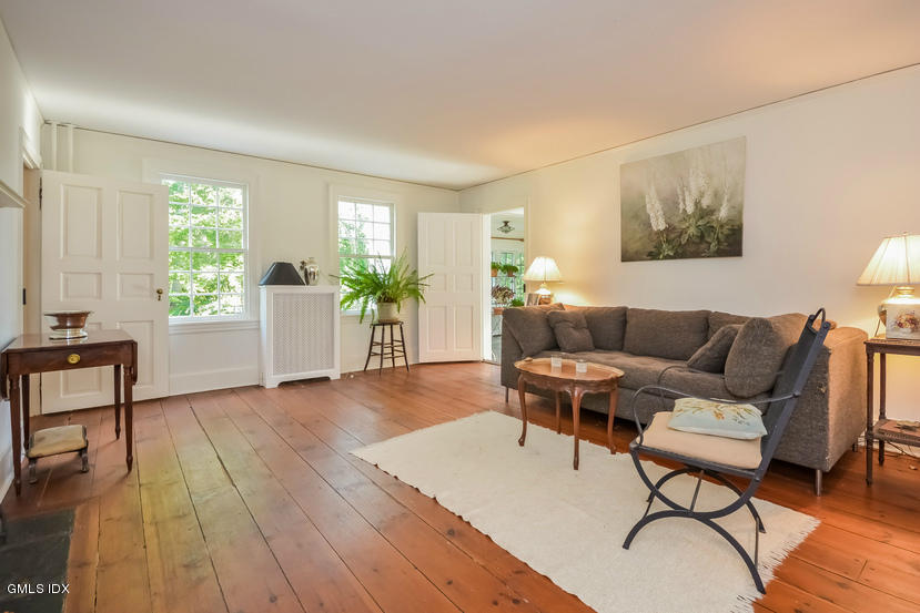 127 Dingletown Road Greenwich, CT 06830 - Photo 7 of 48 a living room with furniture and wooden floor