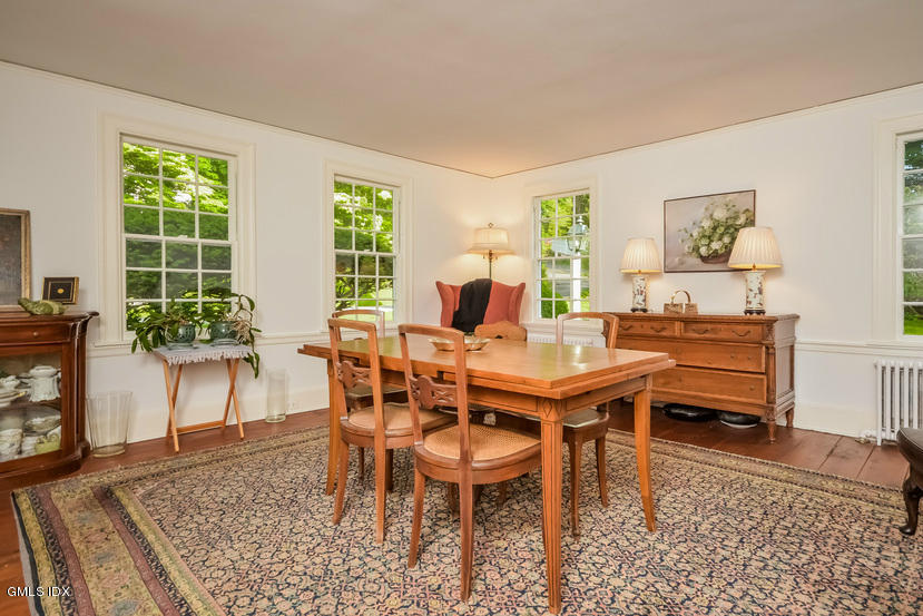 127 Dingletown Road Greenwich, CT 06830 - Photo 9 of 48 a view of a dining room with furniture