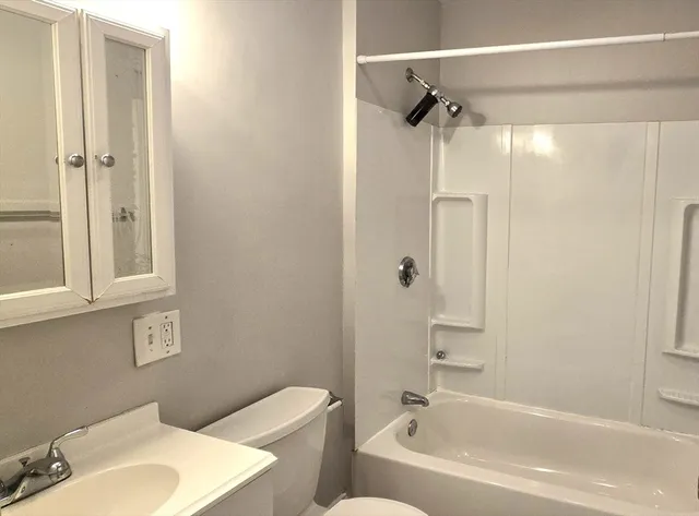a bathroom with a sink and a bathtub