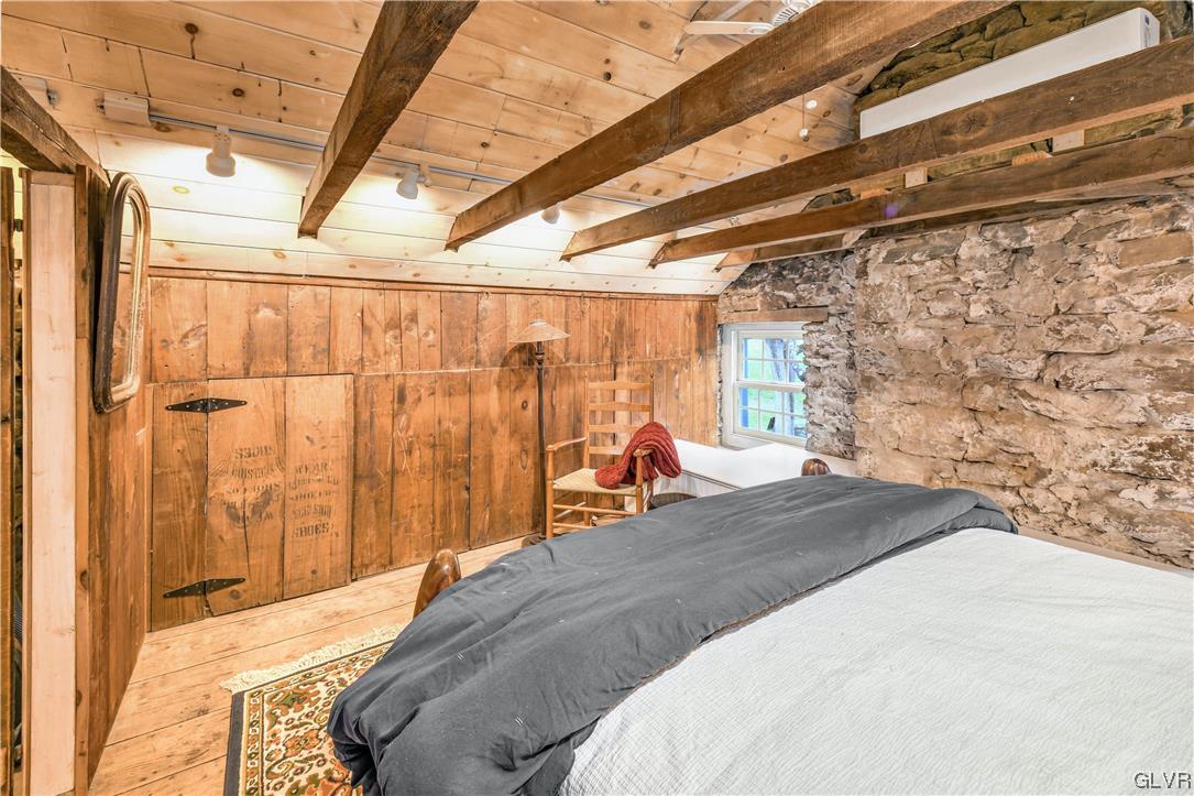 776 Stouts Valley Road Riegelsville, PA 18077 - Photo 25 of 34 a bed room with a bed and a chair