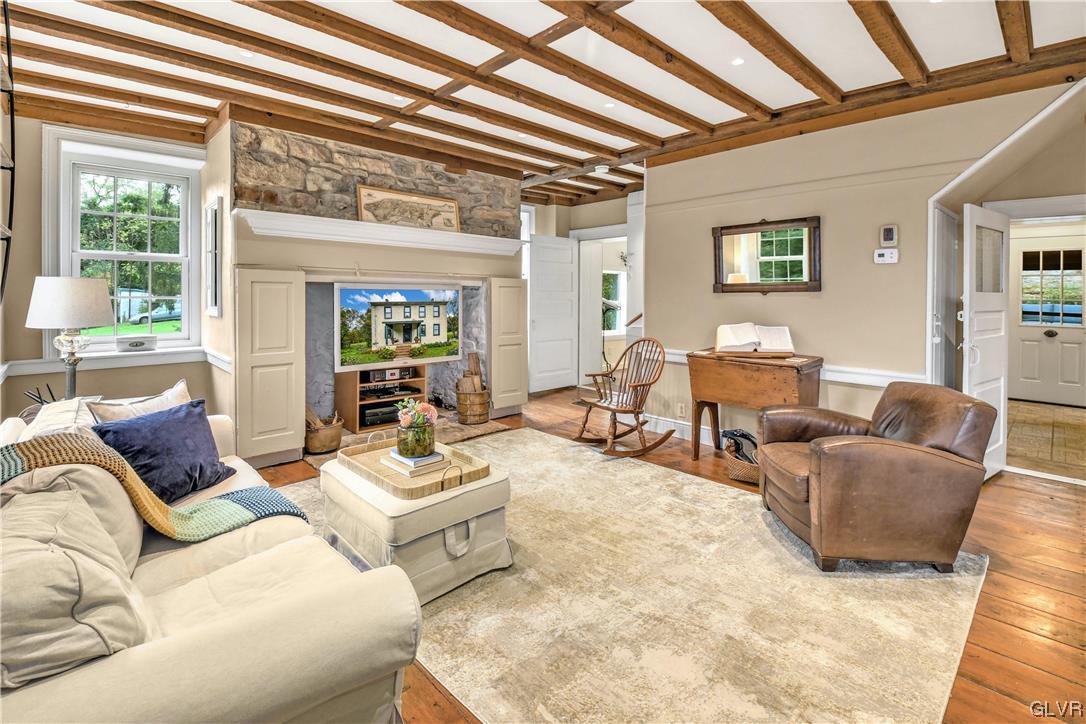 776 Stouts Valley Road Riegelsville, PA 18077 - Photo 3 of 34 a living room with furniture and a large window