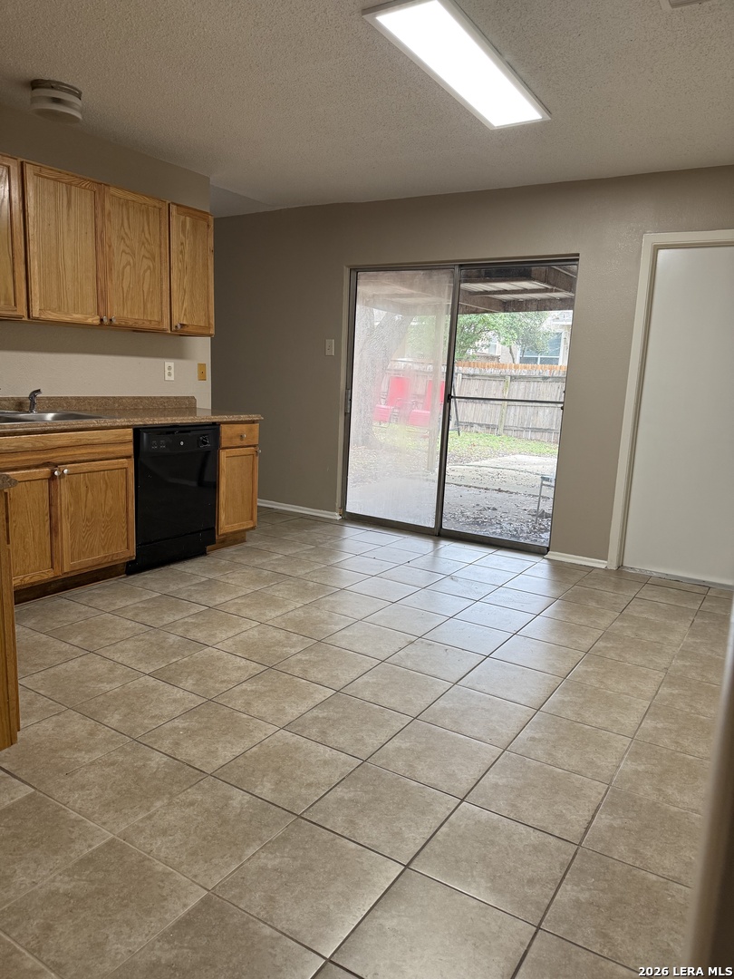 6626 Spring Garden Street San Antonio, TX 78249 - Photo 5 of 10 a view of a kitchen with a sink and cabinets