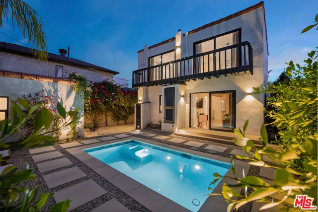 a view of swimming pool with patio