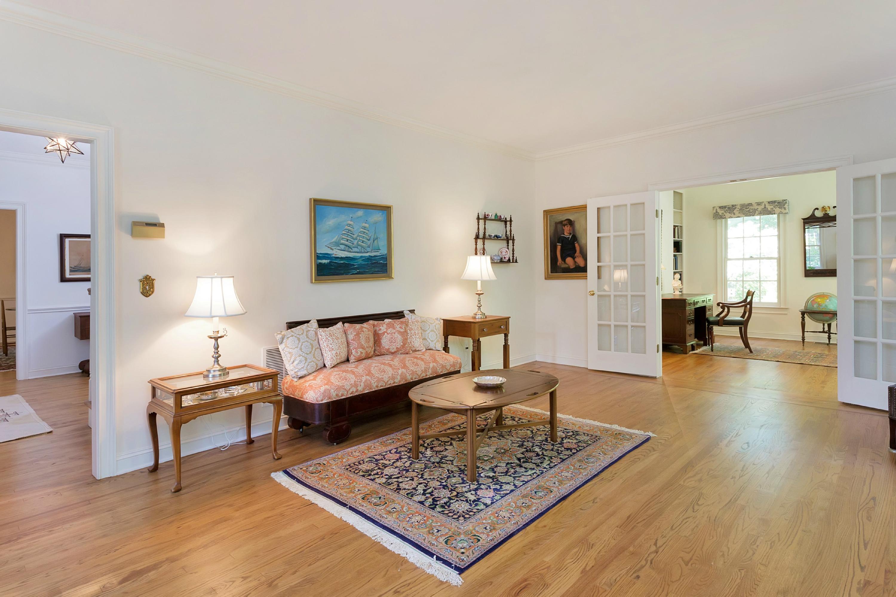 55 Rings End Road Darien, CT 06820 - Photo 4 of 29 a living room with furniture and a wooden floor