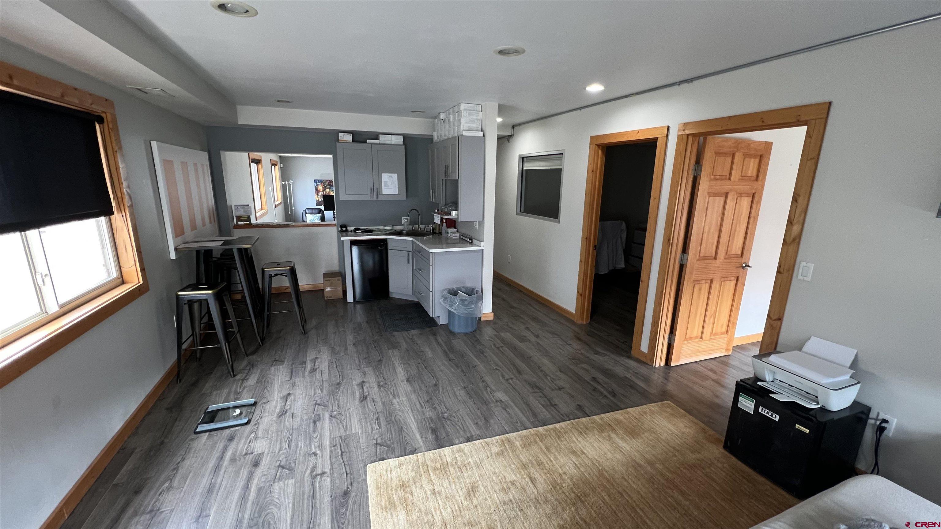 3065 Main Avenue Durango, CO 81301 - Photo 14 of 14 a kitchen with a table chairs refrigerator and window