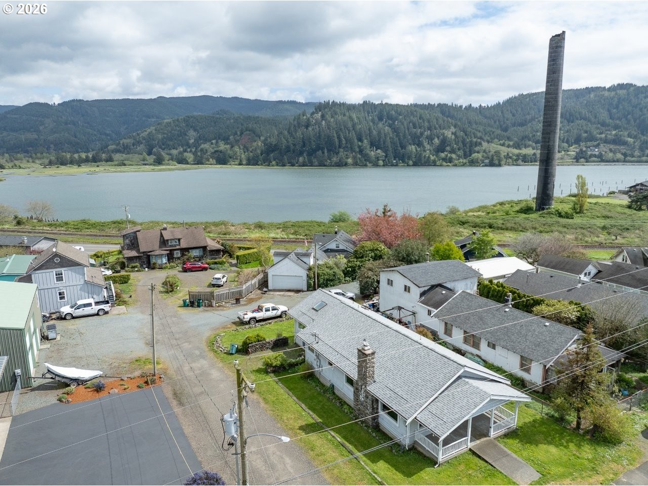 308 1st Street Garibaldi, OR 97118 - Photo 2 of 48 an aerial view of a house with lake view and mountain view