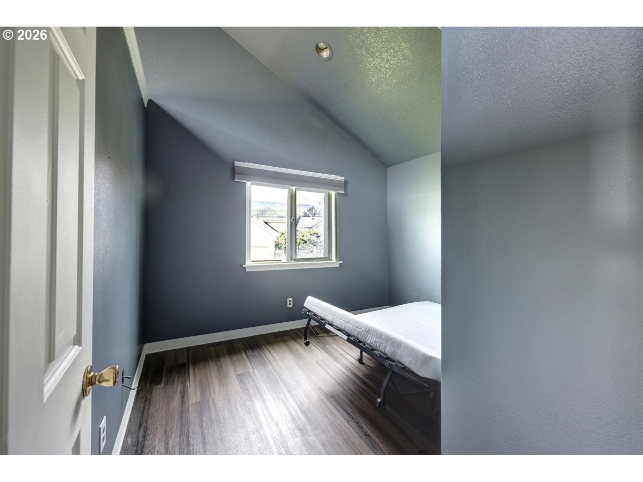308 1st Street Garibaldi, OR 97118 - Photo 28 of 48 a view of an empty room and wooden floor