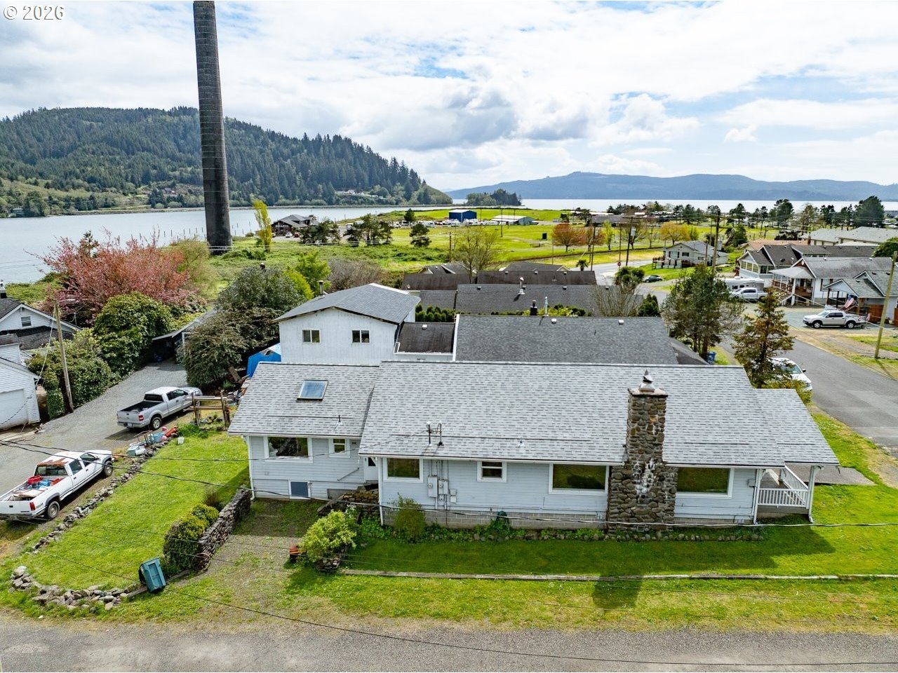 308 1st Street Garibaldi, OR 97118 - Photo 29 of 48 a aerial view of multiple houses with yard