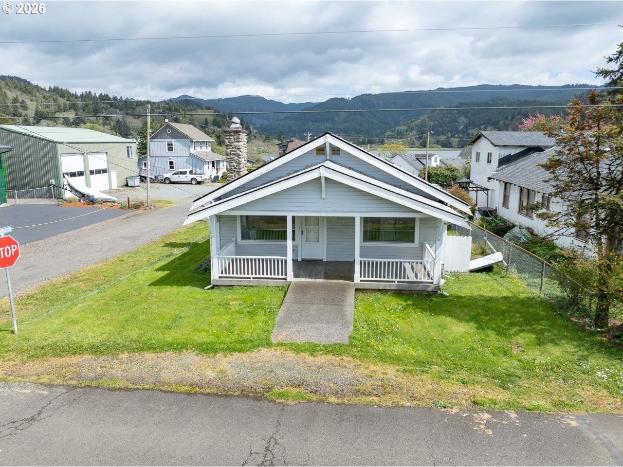 308 1st Street Garibaldi, OR 97118 - Photo 33 of 48 a view of a house with a swimming pool