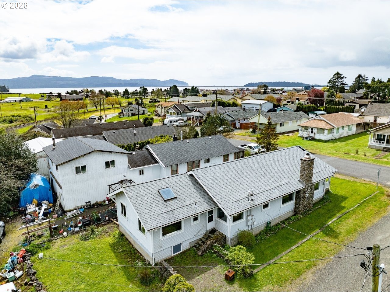 308 1st Street Garibaldi, OR 97118 - Photo 34 of 48 an aerial view of residential house with outdoor space and seating