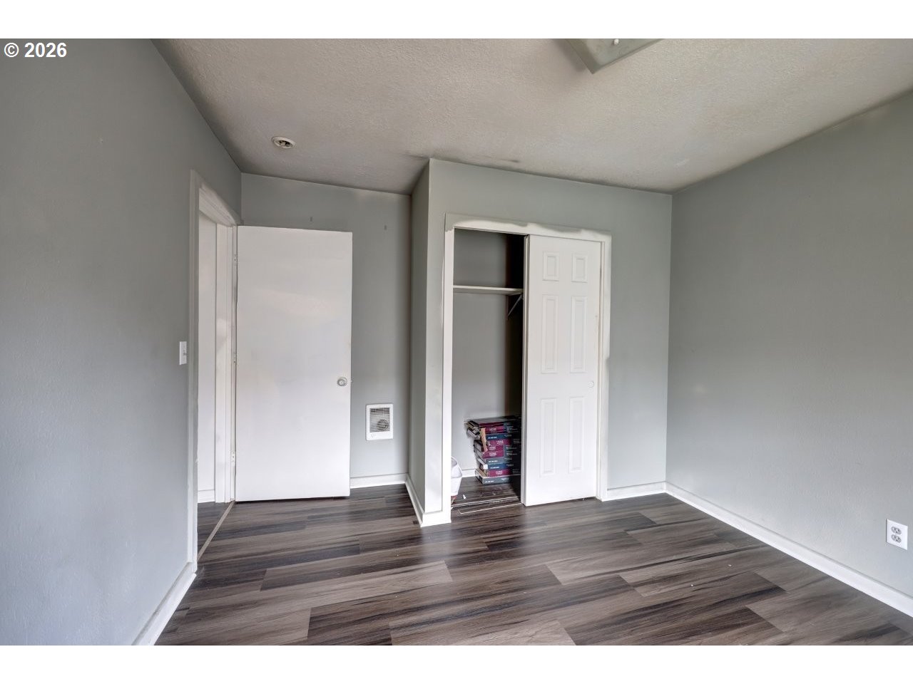 308 1st Street Garibaldi, OR 97118 - Photo 38 of 48 a view of an empty room with wooden floor and closet
