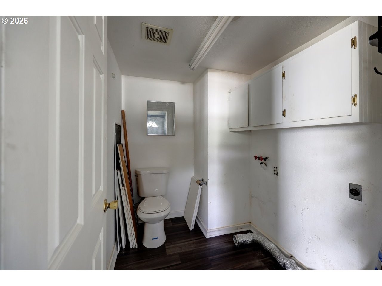 308 1st Street Garibaldi, OR 97118 - Photo 42 of 48 a bathroom with a toilet and a sink