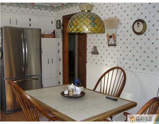 1107 New Dover Road Edison, NJ 08820 - Photo 5 of 10 a dining room with furniture