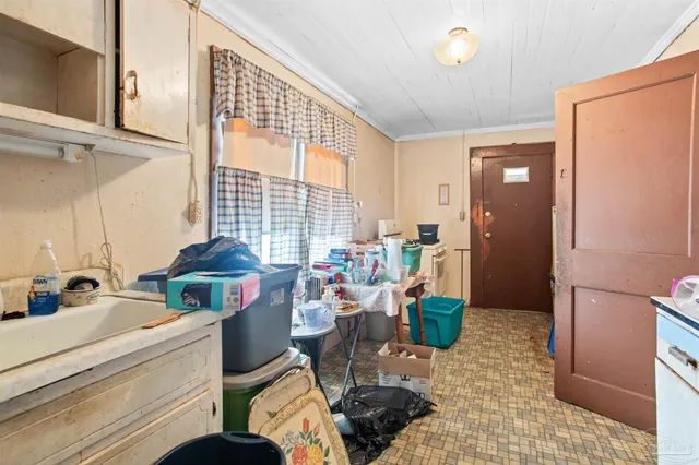 a bathroom with a toilet a sink and a shower