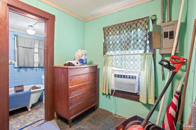 a bathroom with a sink a toilet and bathtub