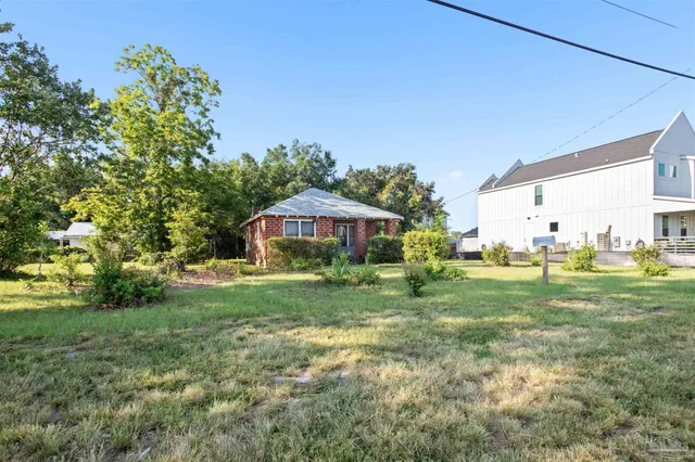 a view of a garden with an outdoor space