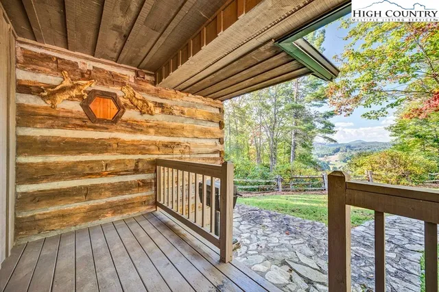 a view of porch with wooden floor