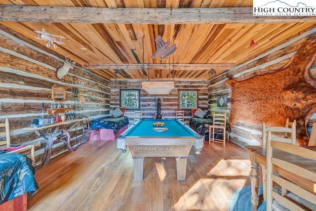 a view of a chairs and table in the patio
