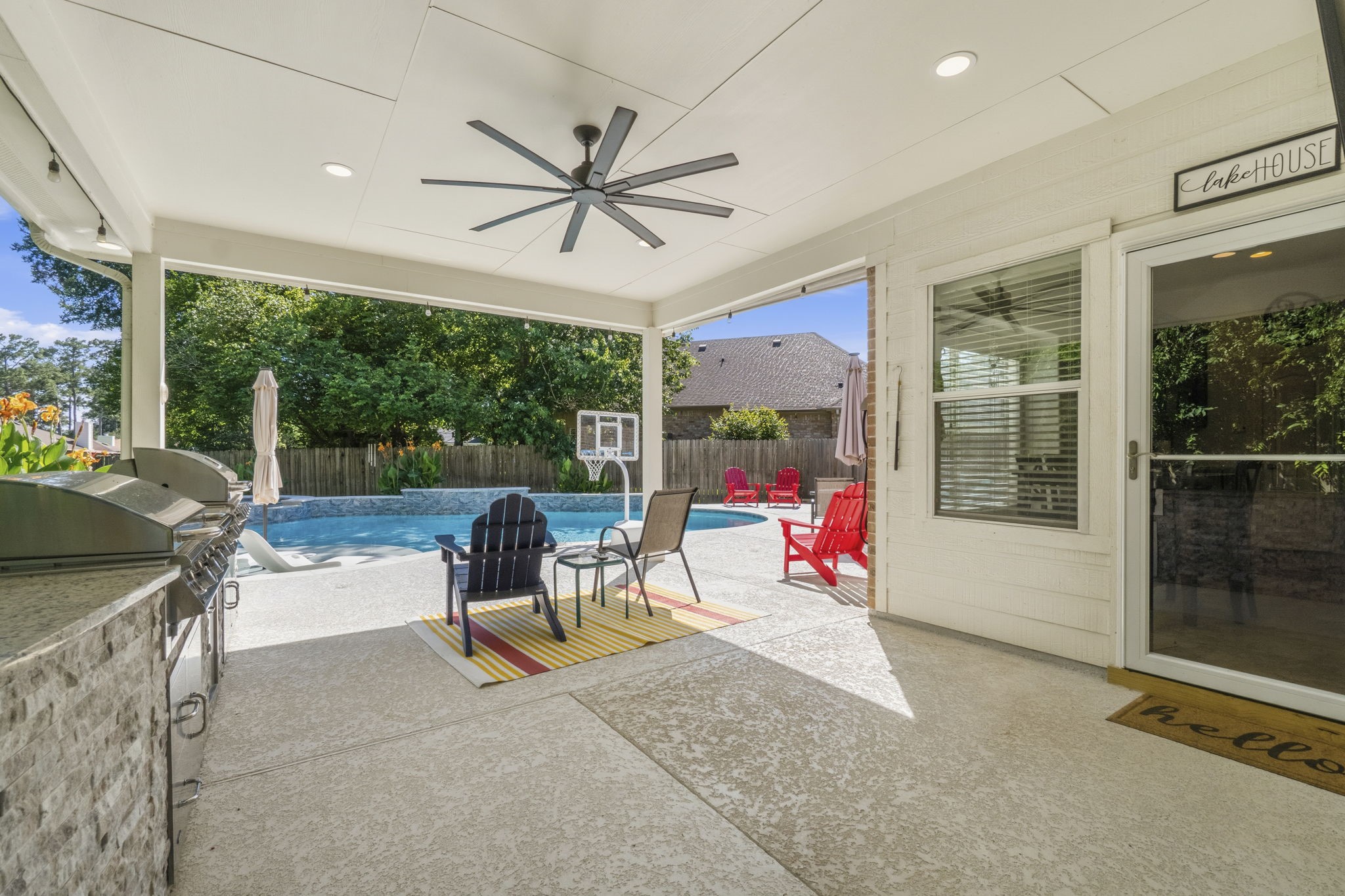 10802 Windswept Montgomery, TX 77356 - Photo 8 of 42 a view of a patio with a table and chairs