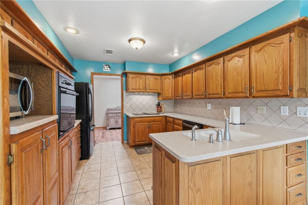 4021 Country Squire Road Oak Grove, MO 64075 - Photo 14 of 45