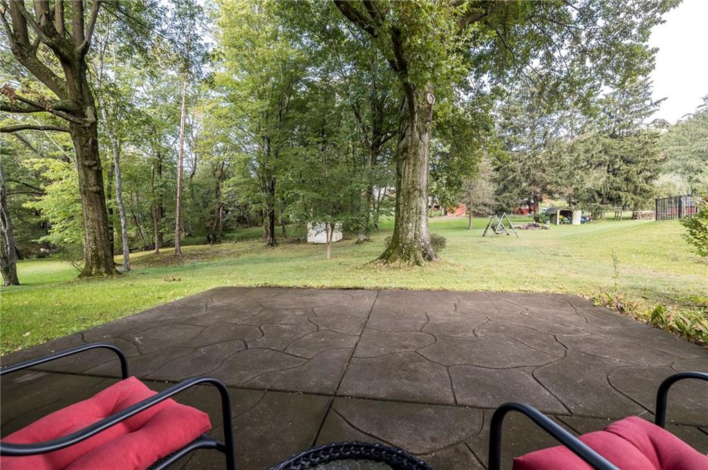 13 Spring Run Road Greensburg, PA 15601 - Photo 11 of 25 a view of a yard with swimming pool and trees