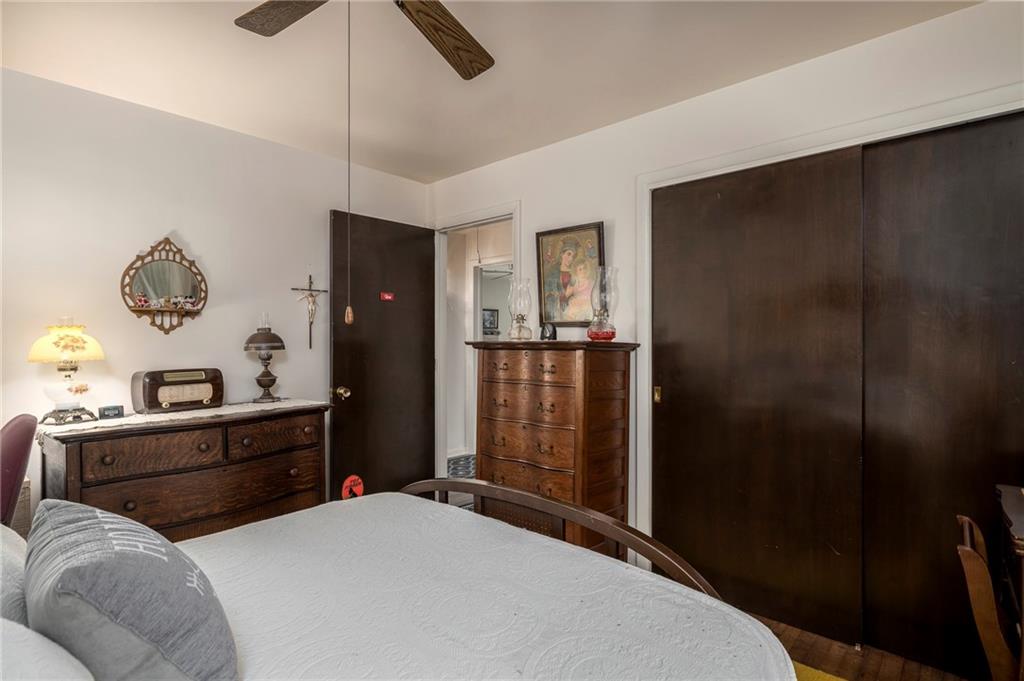 13 Spring Run Road Greensburg, PA 15601 - Photo 18 of 25 a bedroom with a bed and a chandelier