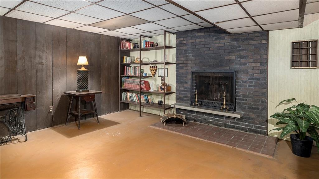 13 Spring Run Road Greensburg, PA 15601 - Photo 22 of 25 a view of a livingroom with furniture and a fireplace