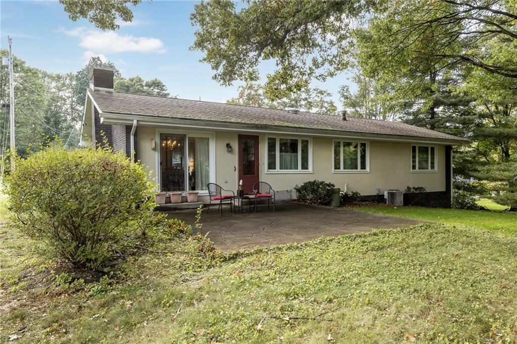 13 Spring Run Road Greensburg, PA 15601 - Photo 23 of 25 a view of a house with backyard and sitting area