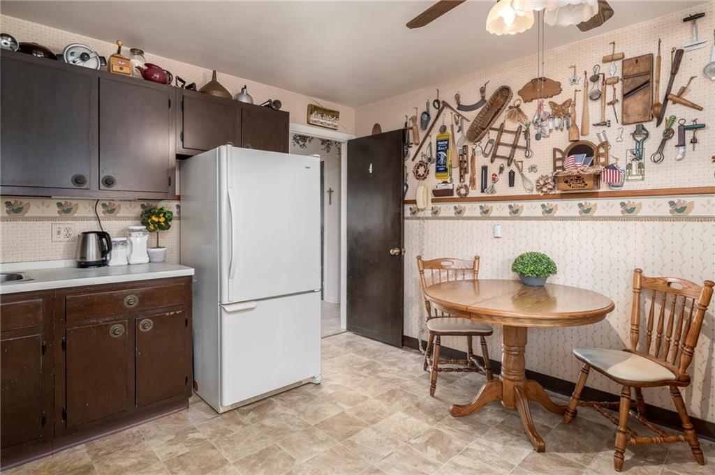 13 Spring Run Road Greensburg, PA 15601 - Photo 9 of 25 a kitchen with stainless steel appliances granite countertop a refrigerator and a stove top oven