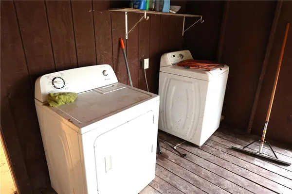 a bathroom with a toilet and a bathtub