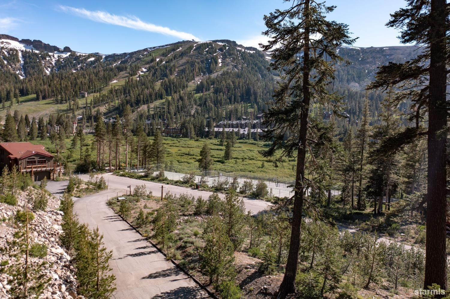 806 Glove Rock Road Kirkwood, CA 95646 - Photo 1 of 18 a view of a lake with a mountain