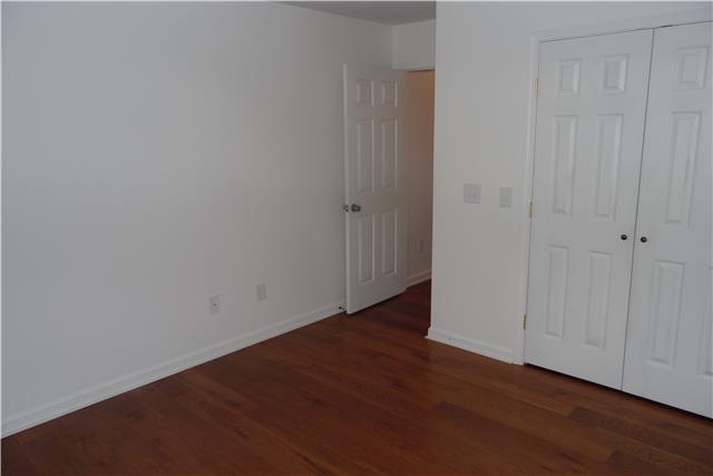 491 Rabbit Trail Road Leoma, TN 38468 - Photo 12 of 19 a view of an empty room with wooden floor