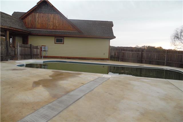 491 Rabbit Trail Road Leoma, TN 38468 - Photo 18 of 19 a view of backyard space and front view of a house