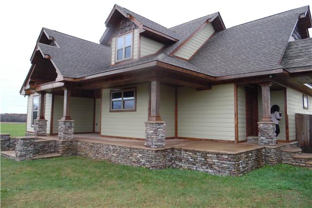 491 Rabbit Trail Road Leoma, TN 38468 - Photo 3 of 19 a front view of a house with garden