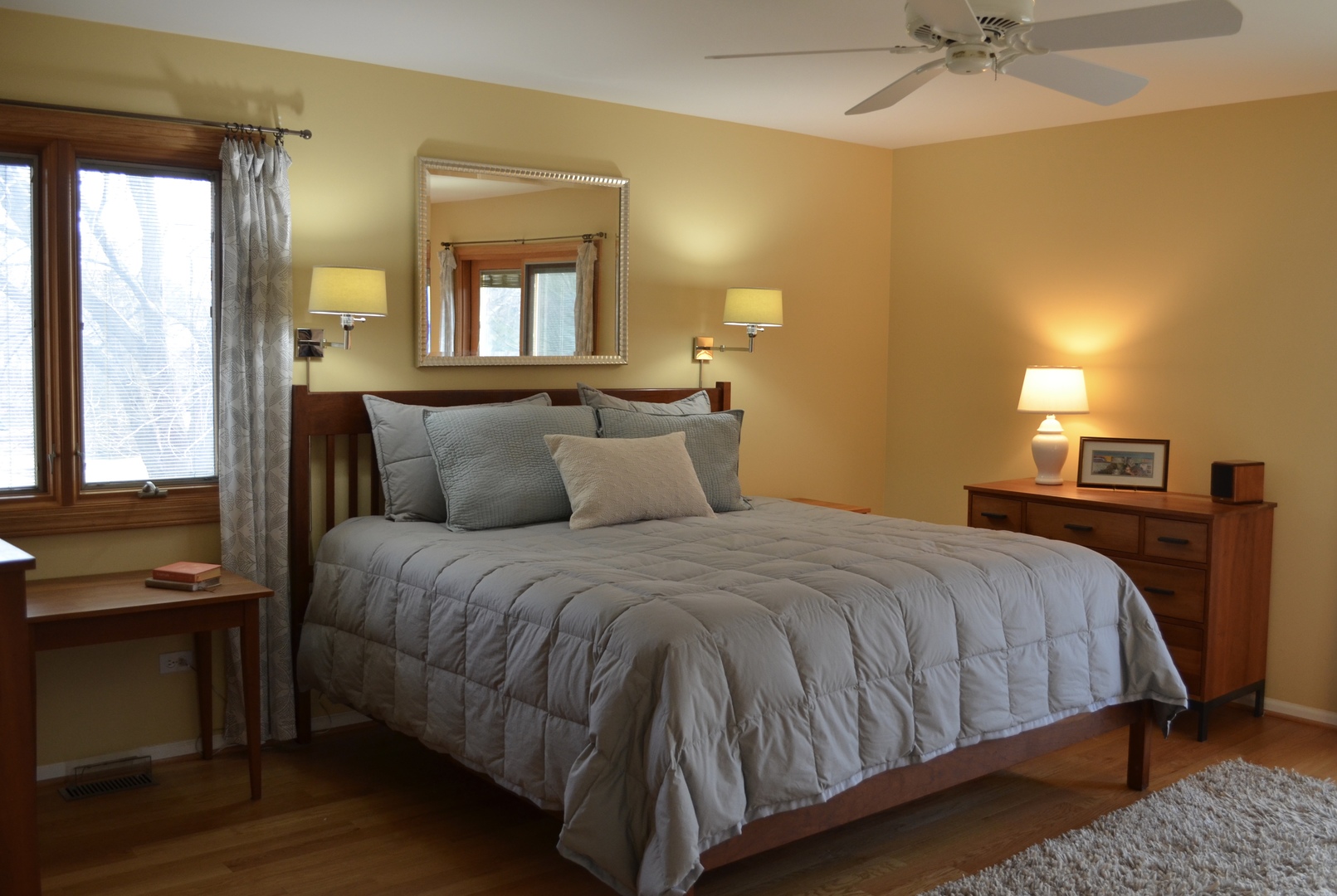 2120 Applecross Road Inverness, IL 60010 - Photo 15 of 38 a bedroom with a bed and a chandelier