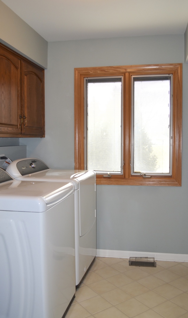 2120 Applecross Road Inverness, IL 60010 - Photo 26 of 38 a room with a window and a kitchen view