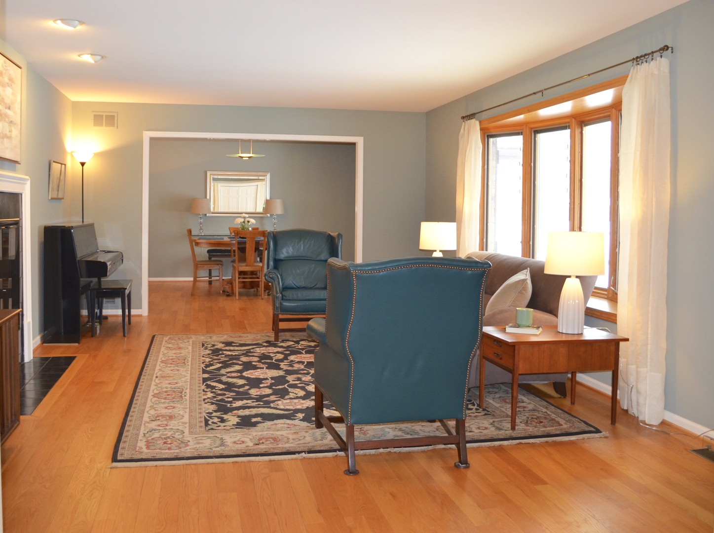 2120 Applecross Road Inverness, IL 60010 - Photo 4 of 38 a living room with furniture a rug and a large window
