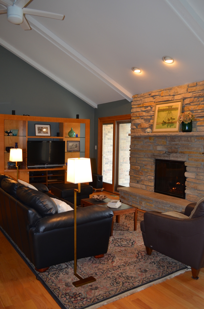 2120 Applecross Road Inverness, IL 60010 - Photo 10 of 38 a living room with furniture and a fireplace