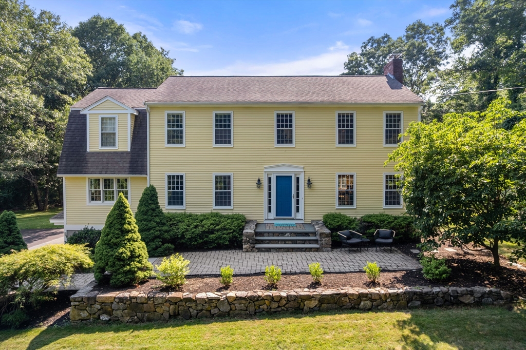 24 Russett Hill Road Sherborn, MA 01770 - Photo 1 of 39 a front view of a house with a yard