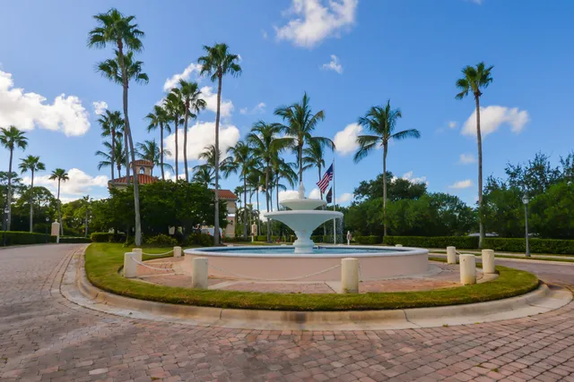 a view of a swimming pool with a house