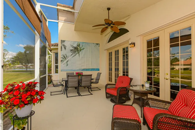a view of an house with backyard space and balcony