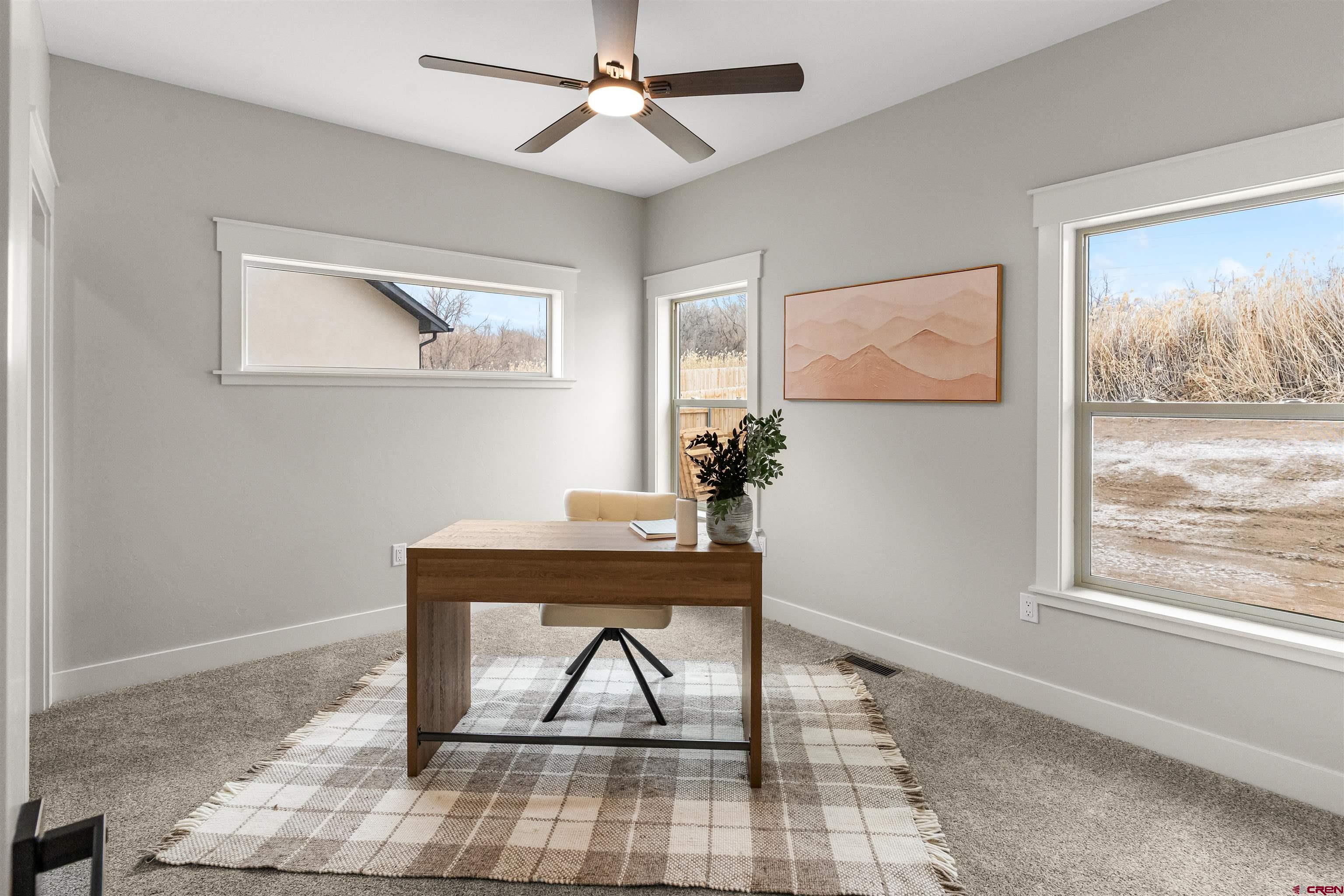 1533 Criterion Street Delta, CO 81416 - Photo 25 of 30 a view of a workspace with furniture