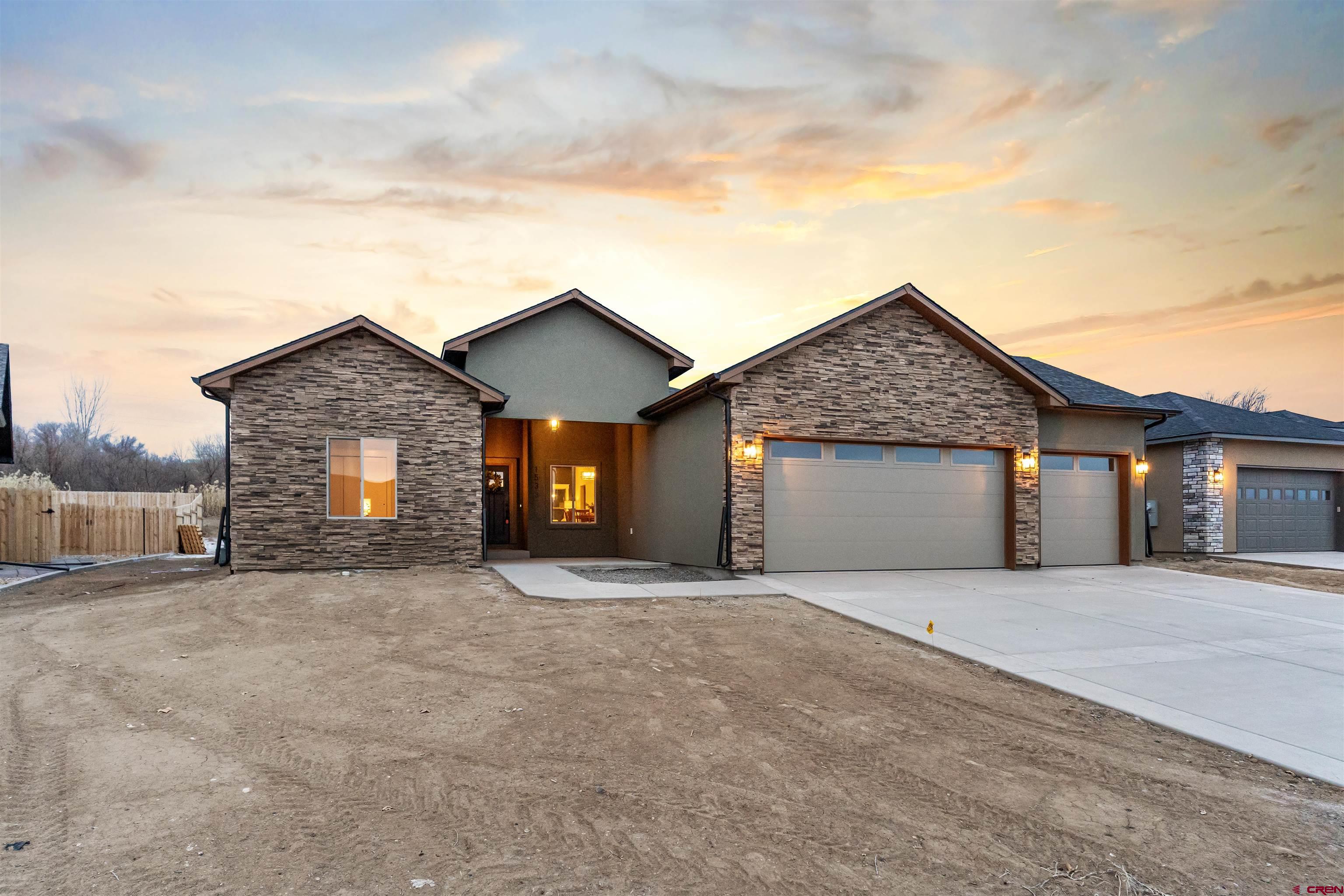 1533 Criterion Street Delta, CO 81416 - Photo 3 of 30 front view of a house with a outdoor space